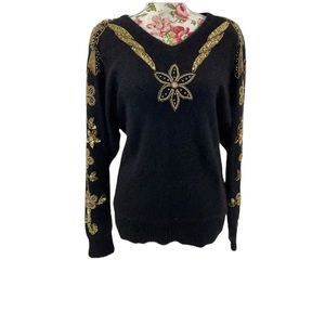 Vintage embroidered black holiday sweater.